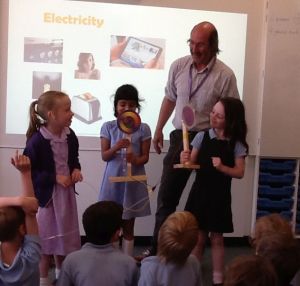 kids in classroom experimenting with windmills